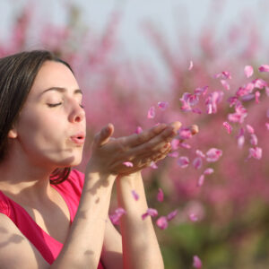 pranayama and breathwork blowing flowers